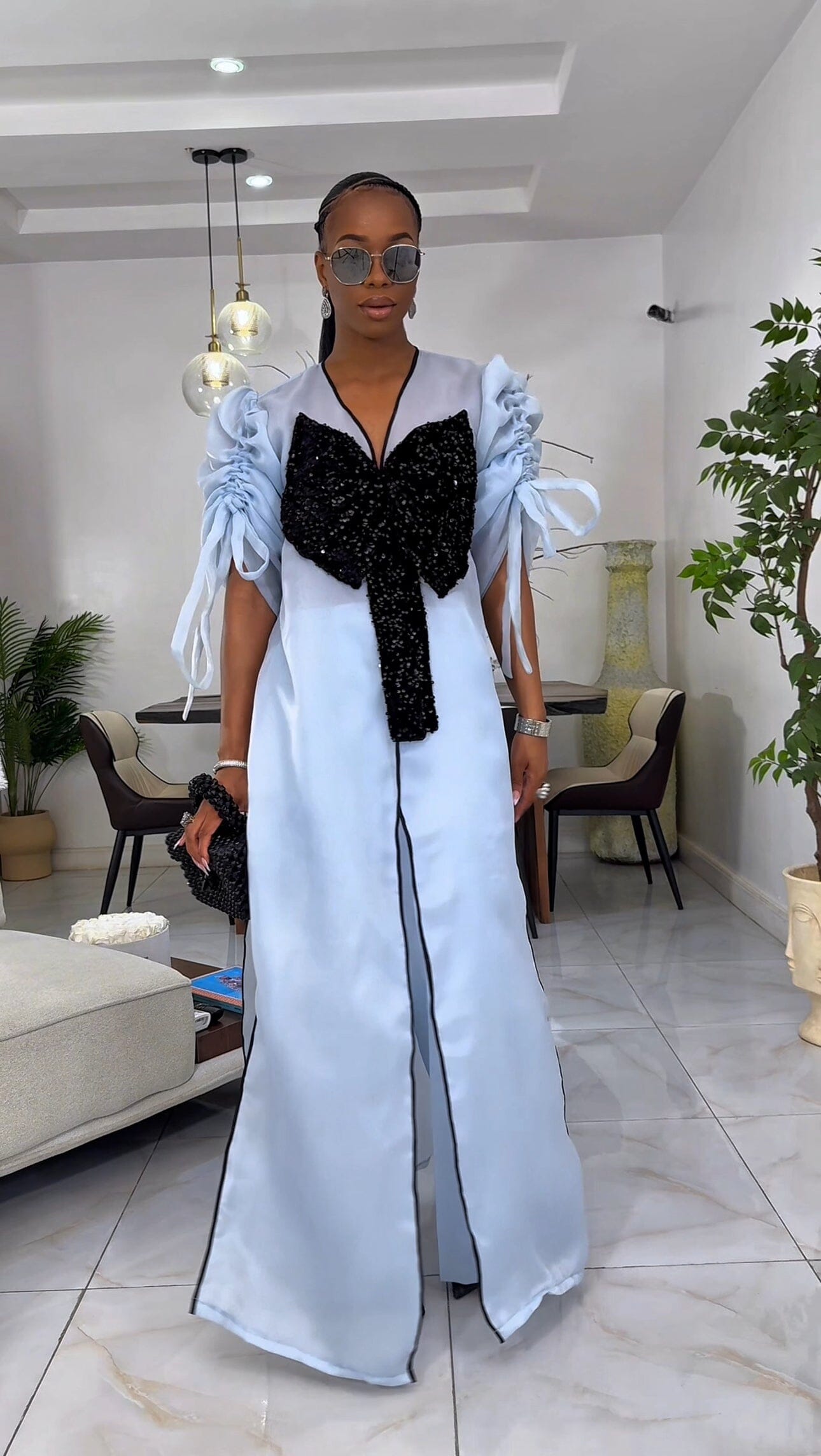 Blue kimono with black bow sequin and wide leg pant set.