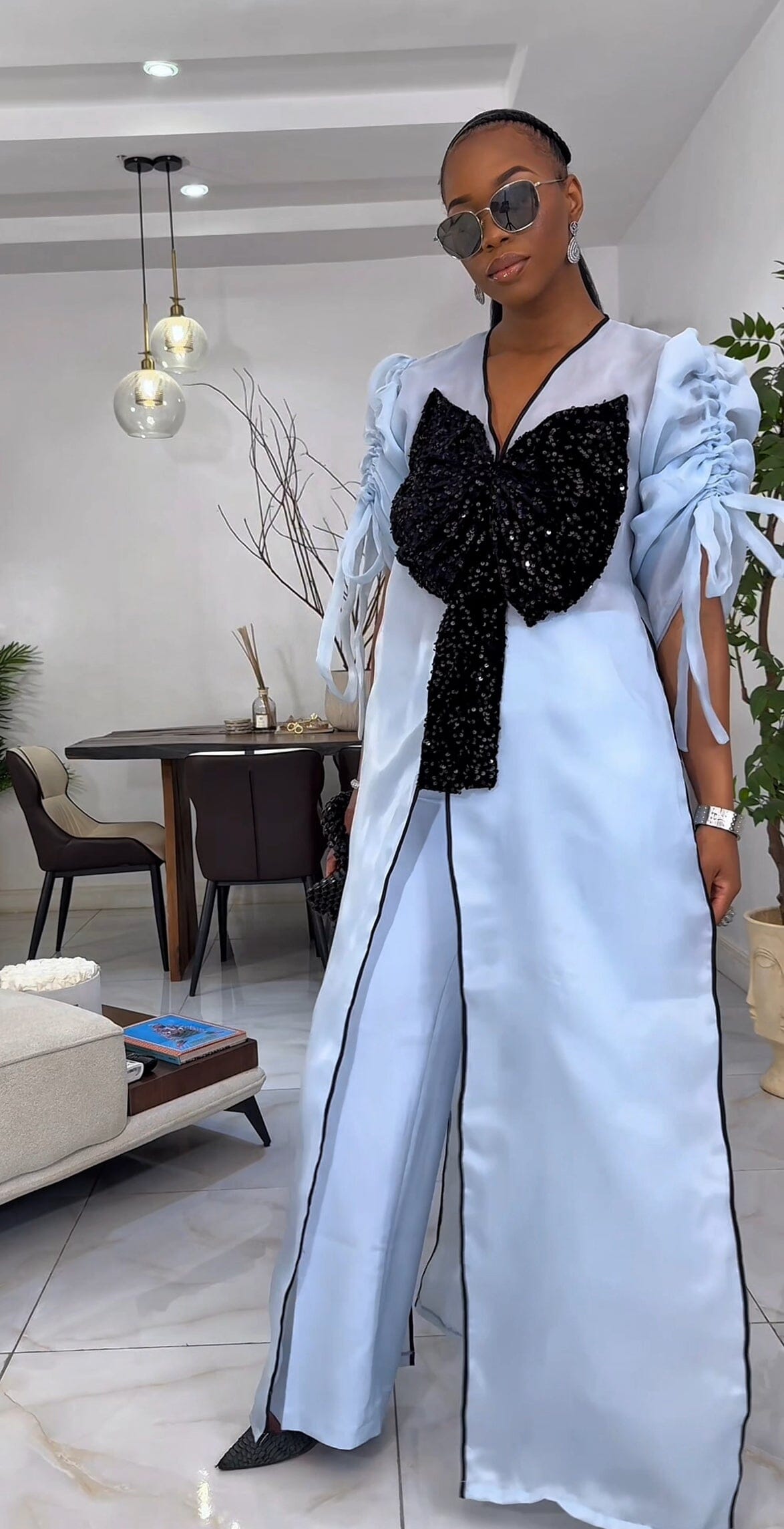 Blue kimono with black bow sequin and wide leg pant set.