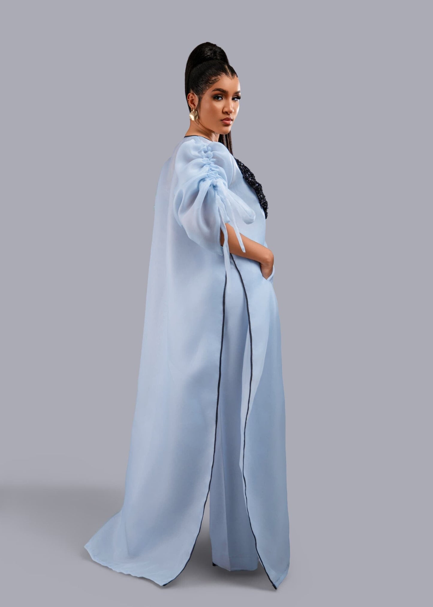 Blue kimono with black bow sequin and wide leg pant set.