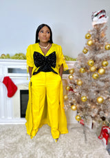 Yellow kimono with black bow sequin and white wide leg pants Look 17
