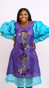 Long sleeve Purple and teal three quarter dress with sequin detailing. Look 3