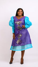 Long sleeve Purple and teal three quarter dress with sequin detailing. Look 3